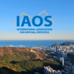 IAOS logo that has a yellow line behind the letters IAOS. It's sitting in the front of a drone shot of Busan Korea
