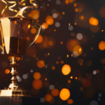 Trophy with sparkling confetti in the background