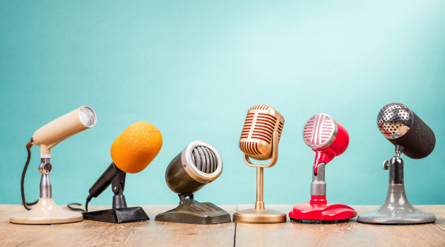 A set of multi-colored microphones.